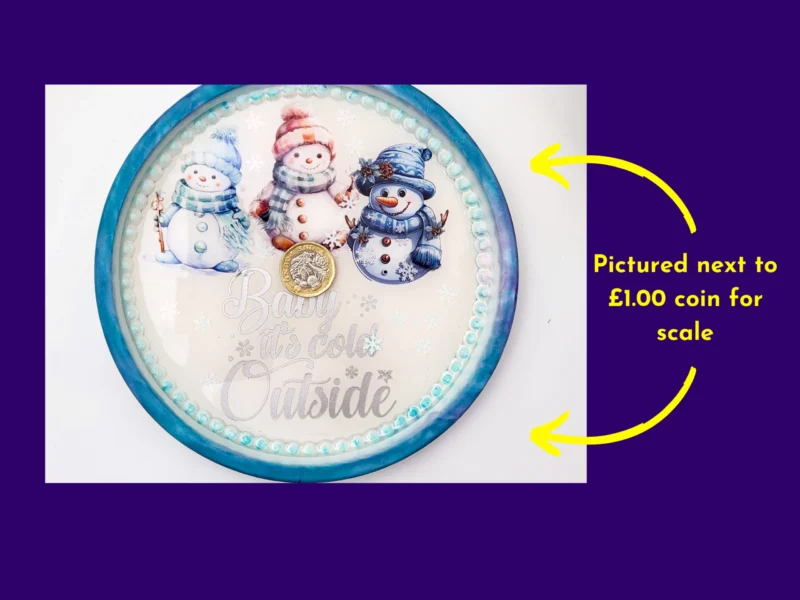 Snowman tray pictured next to a £1 coin for size reference.