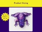 10. kirnix product sizing โPurple glitter resin frog shown from above with a butterfly on its back, with a graphic listing size as 10 cm x 13.5 cm x 3.5 cm.โ