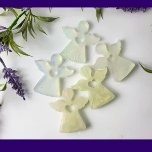 Handmade resin Guardian Angels displayed in a group with lavender and greenery.