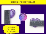 PP-Product-Sizing (2) Pocket Peepers heart-shaped fidget pebble measured against a ruler to show its size in centimetres.