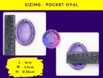 PP-Product-Sizing Pocket Peepers oval-shaped fidget pebble photographed beside a ruler to display accurate length and width.
