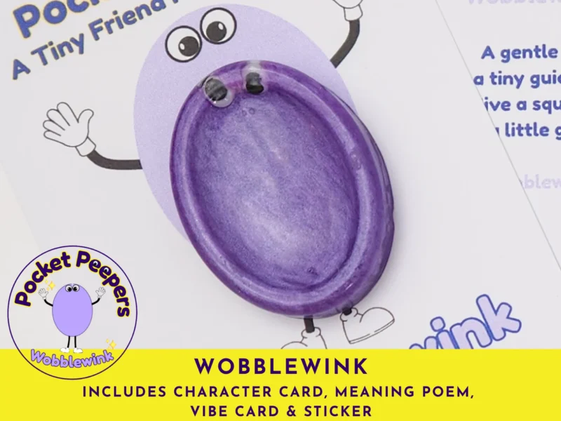 Close-up of the Wobblewink Pocket Peepers stone attached to its character card, with the full set contents listed beneath
