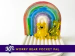 Yellow handheld and keyring Worry Bear pocket pals on rainbow arch tray with Kirnix Creations banne