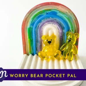 Yellow handheld and keyring Worry Bear pocket pals on rainbow arch tray with Kirnix Creations banne