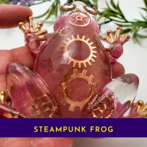 Closeup of steampunk frog showing embedded gears and metallic detailing.