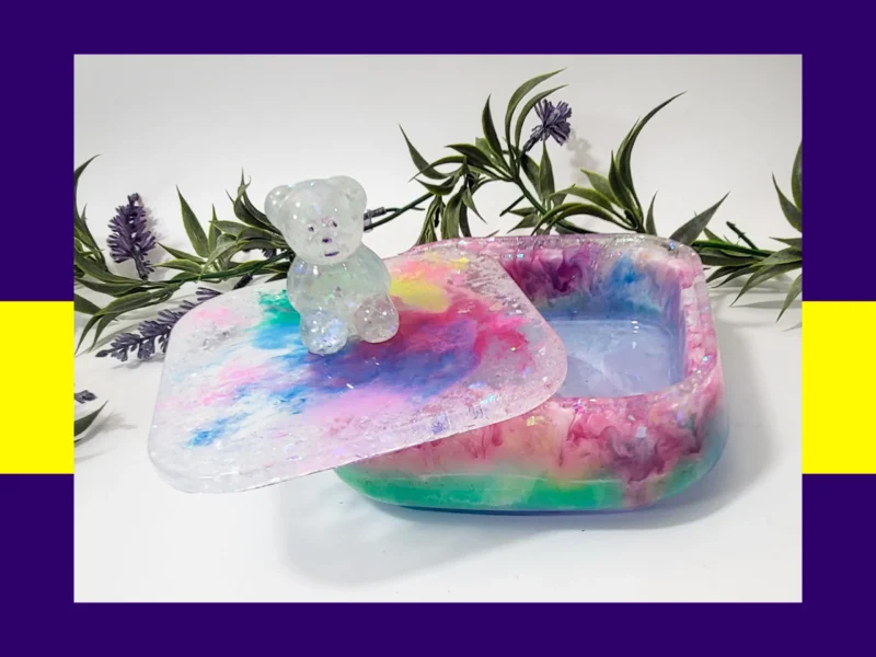 5. Kirnix Listing Open candycore resin treasure box showing the inside, with the lid tilted and the glitter teddy visible on top.