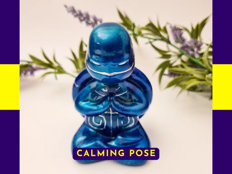 “Front view of the Calming Pose blue Zen turtle with metallic finish and engraved chest markings.”
