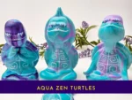 “The full Aqua Zen Turtle Trio displayed together, showing all three OOAK figurines in their unique zen poses.”