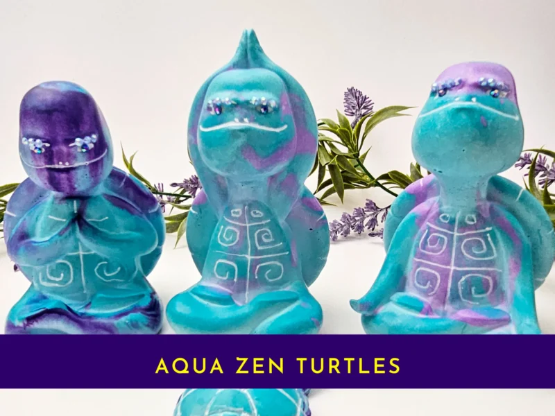“The full Aqua Zen Turtle Trio displayed together, showing all three OOAK figurines in their unique zen poses.”
