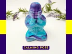 “Front-facing hero shot of the Calming Pose Aqua Zen Turtle with purple facial shading, aqua body and swirling resin pattern.”