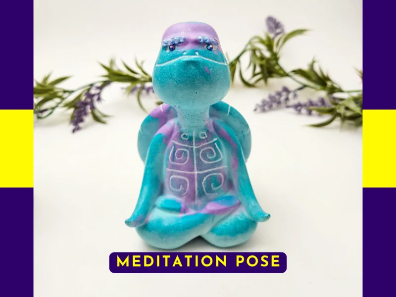 “Front-facing hero shot of the Meditation Pose Aqua Zen Turtle with lilac and teal resin colouring and hand-painted chest markings.”