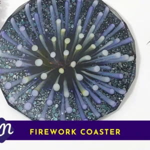 Top-down photo of a dark blue and lilac “firework burst” resin coaster with scattered glitter; a purple banner at the bottom shows a KN logo and the words “FIREWORK COASTER”.