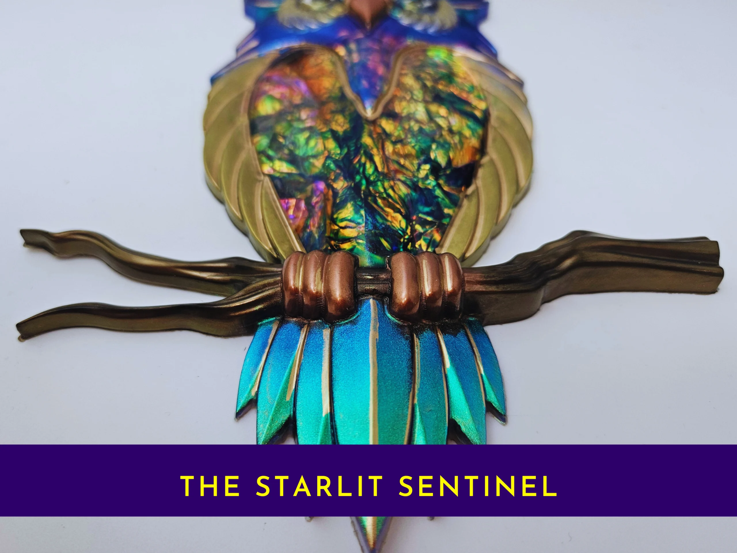 Banner-style image showing the owl’s lower half on a branch with teal tail feathers, with the text “THE STARLIT SENTINEL”.