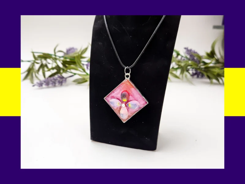 Gift-style collage showing resin pendant necklaces with jewellery box and purple pouch, with gifting text.