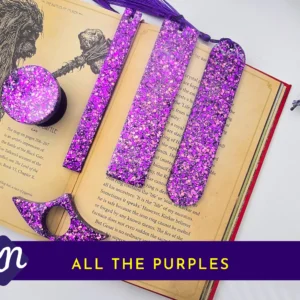 “All the Purples” hero image showing the full purple glitter set on an open book with banner text.