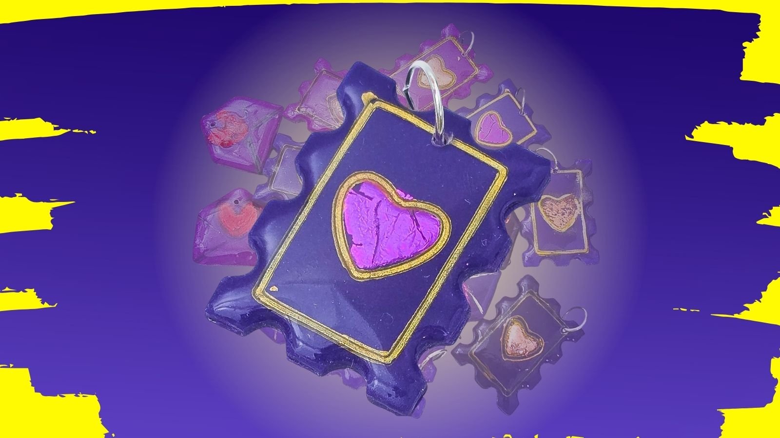 purple clay charm with a metal effect heart in the center