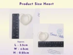 Heart resin worry stone size guide with ruler and measurements in centimetres.