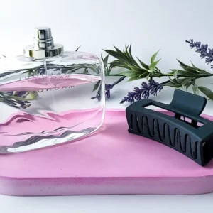 Lifestyle scene showing eco resin tray used as decorative catchall with candles and home décor.