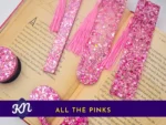 “All the Pinks” hero image showing the full pink glitter set on an open book with banner text.