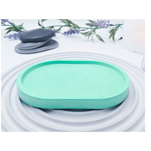 Image 2: Mint green small oval tray on a white ripple background