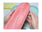 Image 20: Hands holding oval tray