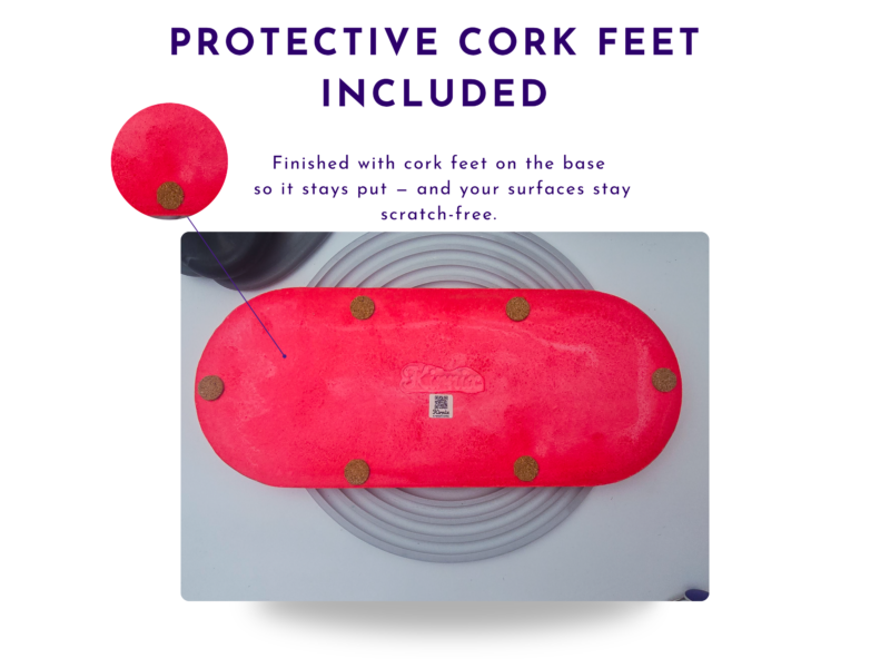 Underside of a RED oval tray showing protective cork feet.