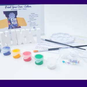 Close up of acrylic paints and brushes included in Paint Your Own Name Kit