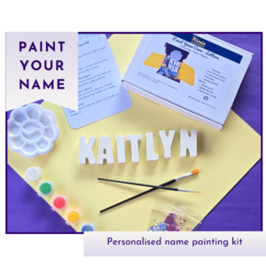 Personalised paint your own name kit showing Kaitlyn name letters with paints, brush, palette and instruction card.