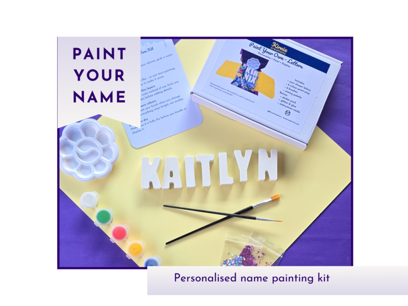 Personalised paint your own name kit showing Kaitlyn name letters with paints, brush, palette and instruction card.