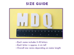 Size guide showing personalised name kit letters beside a ruler with each letter approximately 4 cm tall.