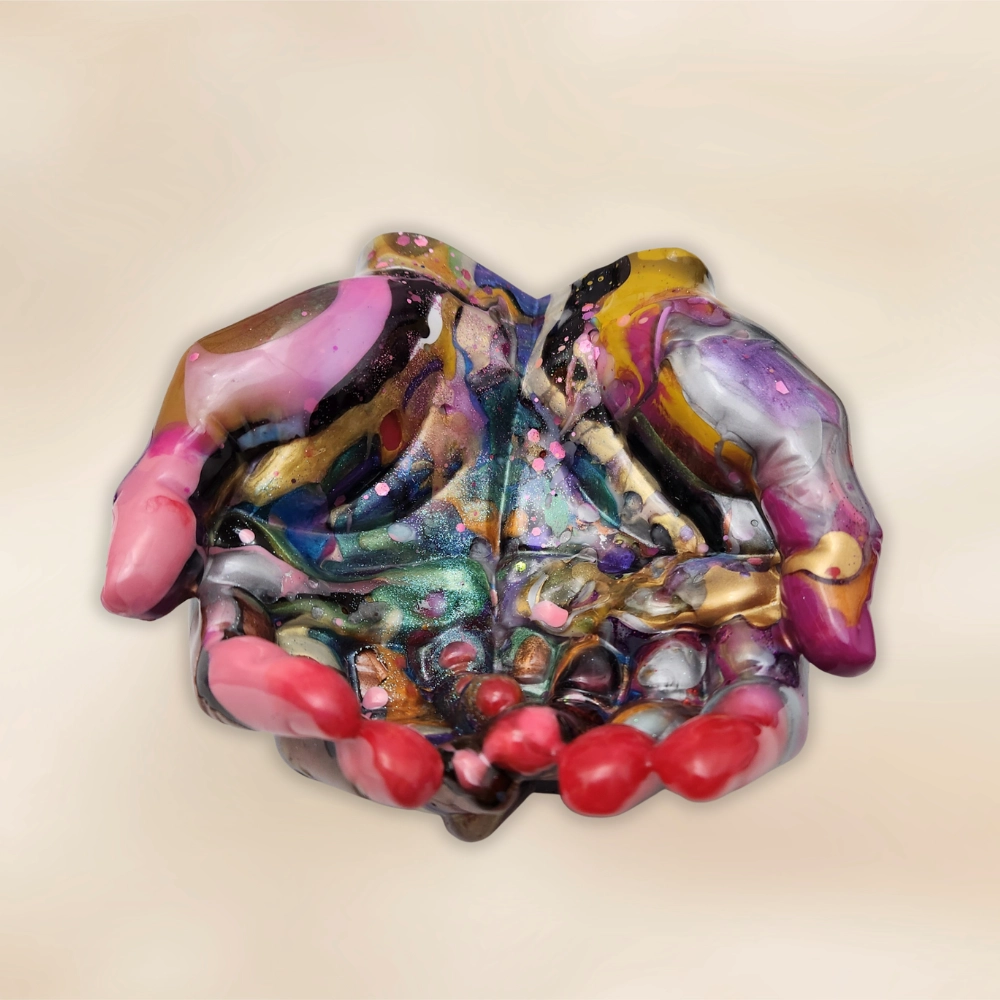 Colourful abstract resin studio piece with pink, gold and teal swirls on a soft oat background.