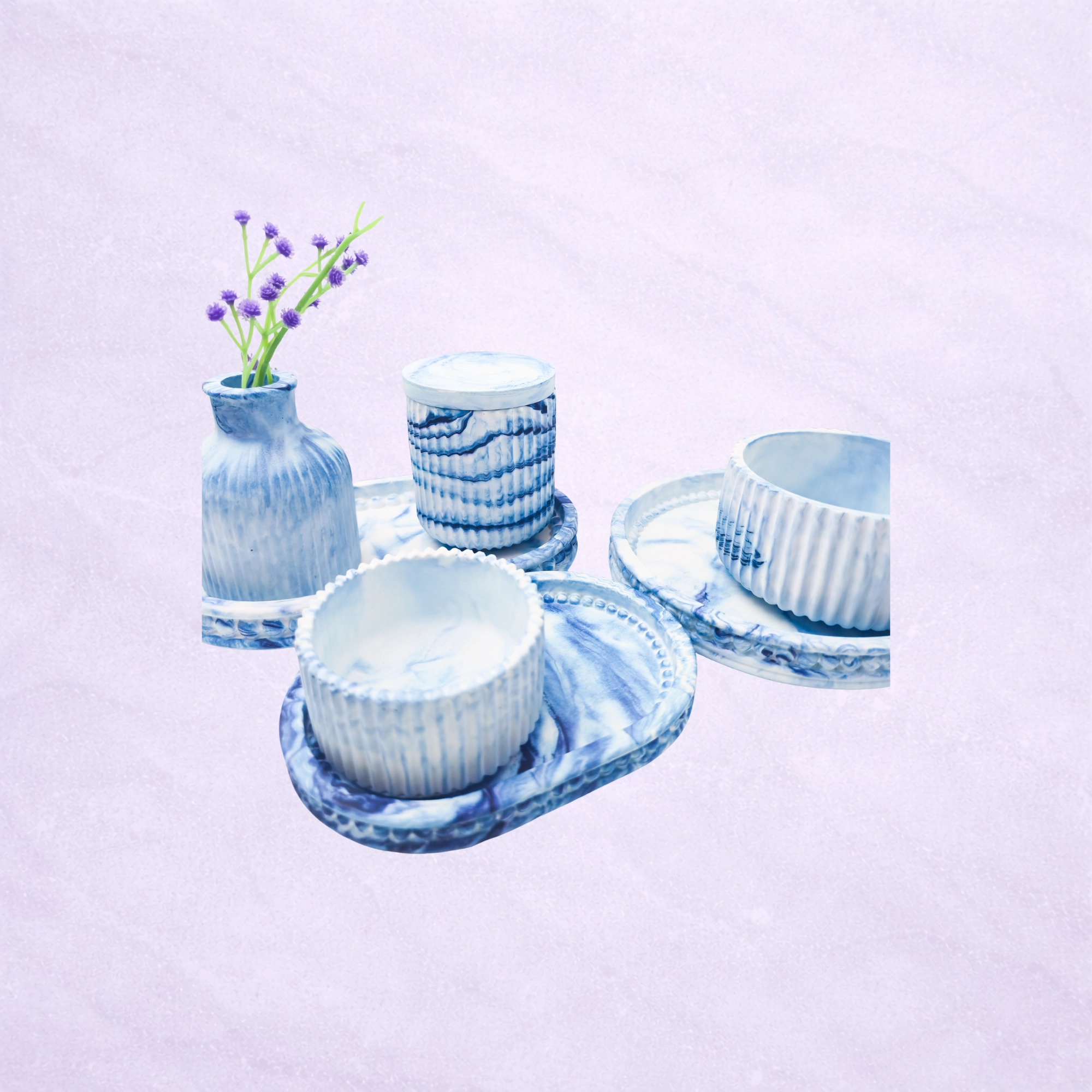 Lavender background with a blue marble gift set