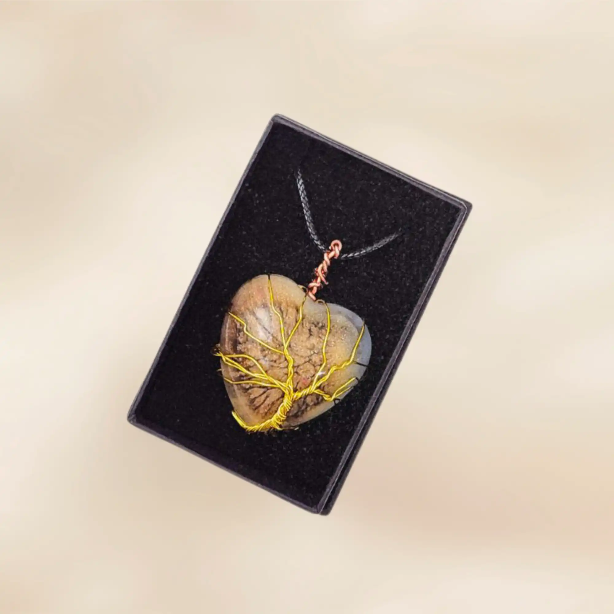 handmade pendant with wire wrapped tree