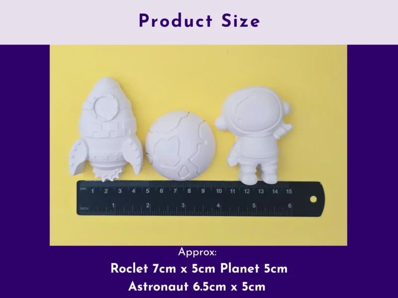 Size comparison of astronaut rocket and planet plaster shapes with ruler for scale