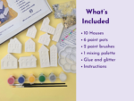Craft kit contents: white plastic house shapes, small paint pots, brushes, glitter, and glue on a yellow surface with a 'What’s Included' list on lavender background.