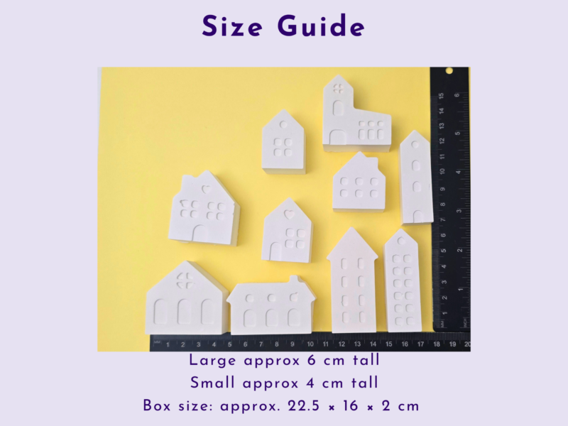 Size guide illustration: white toy houses laid on a yellow background with a ruler, listing large ~6 cm tall, small ~4 cm tall, box ~22.5×16×2 cm.