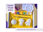 Hero product image showing a boxed paint your own space adventure kit with blank astronaut, rocket and planet shapes, paint pots and glitter