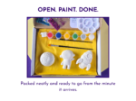 Open space craft kit laid out neatly in the box with blank shapes, paints, brushes and glitter