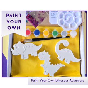 Boxed paint your own dinosaur craft kit with three blank dinosaur figures, paint pots, glitter and palette