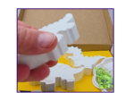 Video thumbnail showing the boxed dinosaur kit with blank figures and paint supplies