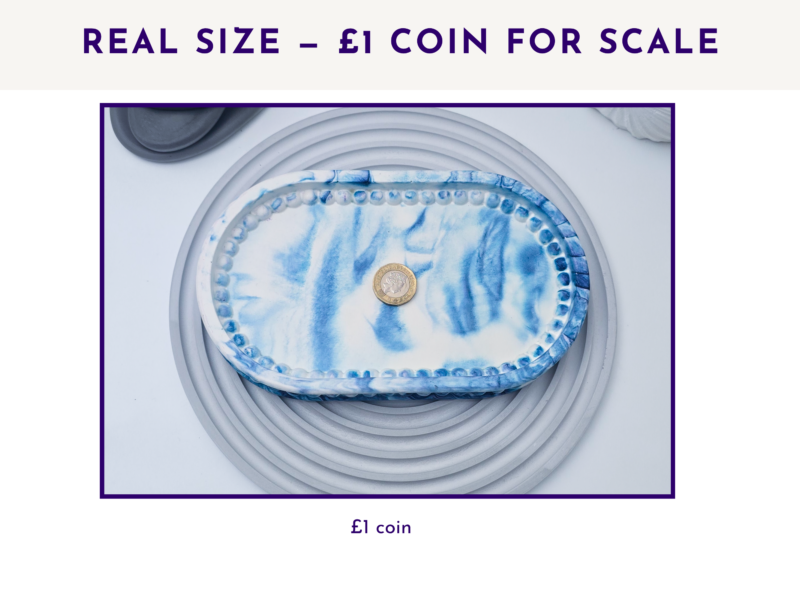 Blue marble oval tray shown with a £1 coin in the centre for size reference.