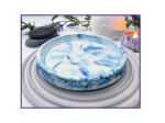 Clean angled view of a blue and white marbled oval tray on a ribbed grey mat