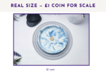 Small blue marbled oval tray beside a £1 coin for size comparison