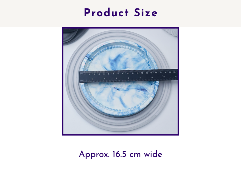 Top view of the small oval tray with ruler showing approximate dimensions