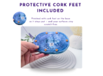 Blue oval soap dish with protective cork feet on the base; inset shows a close-up of the cork feet to prevent scratching.