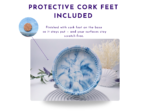 Underside of the small oval tray showing protective cork feet