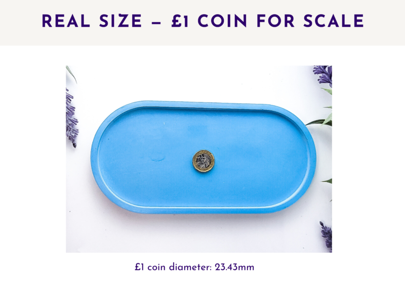 Blue oval tray shown with a £1 coin in the centre for size reference