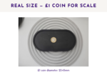 Black oval tray with a £1 coin placed in the centre for size reference.