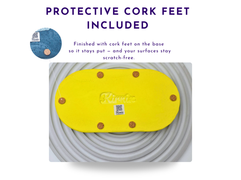 Yellow oval tray photographed from underneath showing protective cork feet.