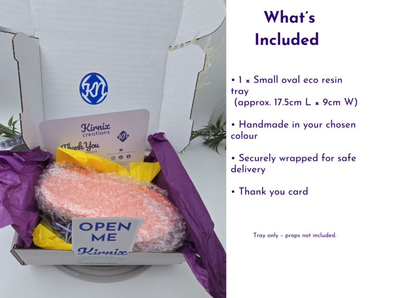 Open box showing a pink oval tray wrapped in tissue with a thank you card and packaging insert.